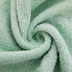 Coppia asciugamani viso e ospite spugna verde