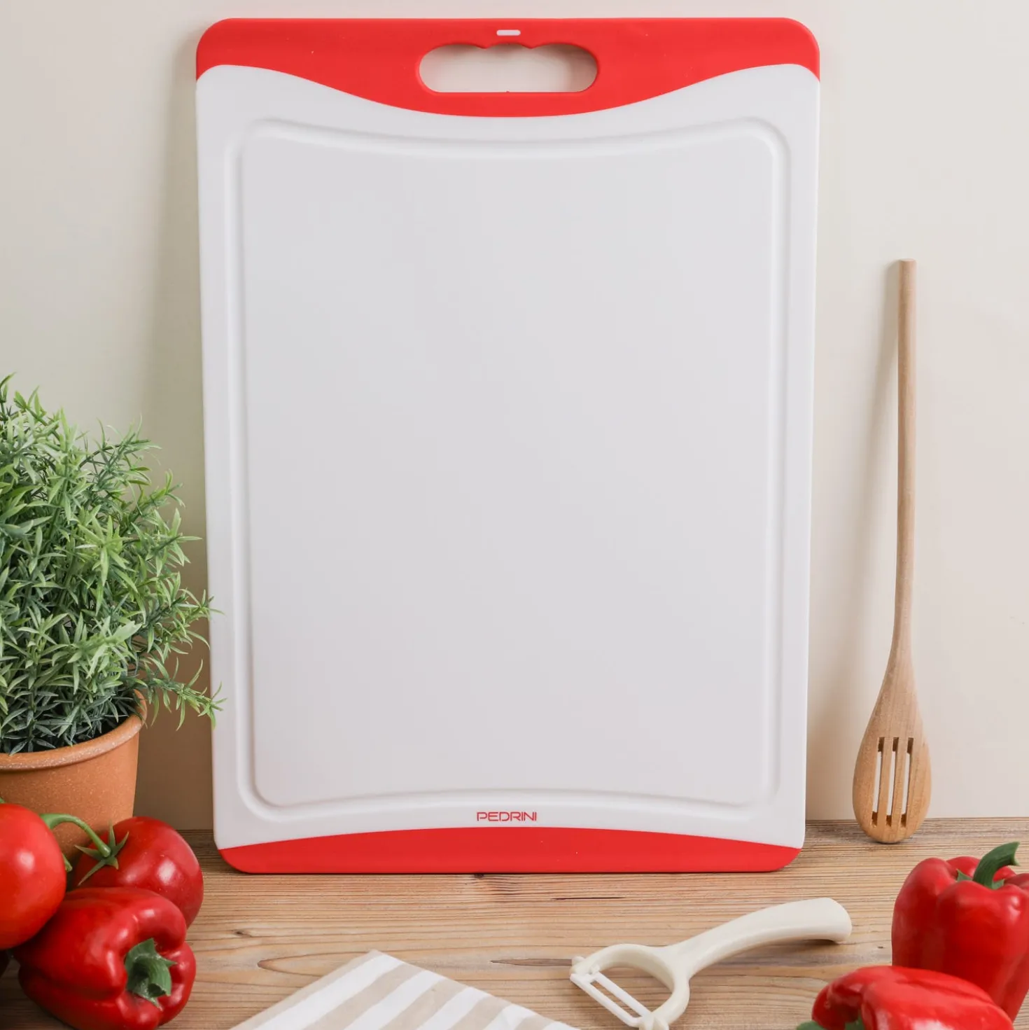 Tagliere 44x30 cm in plastica con bordi in gomma