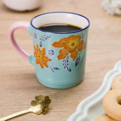 Tazza mug fiori 310 ml in porcellana arancione e azzurra