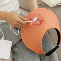 Visiera regolabile con ventilatore rosa salmone